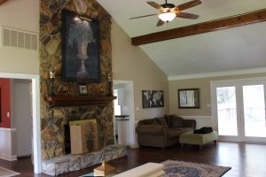 Vaulted ceiling family room with fireplace
