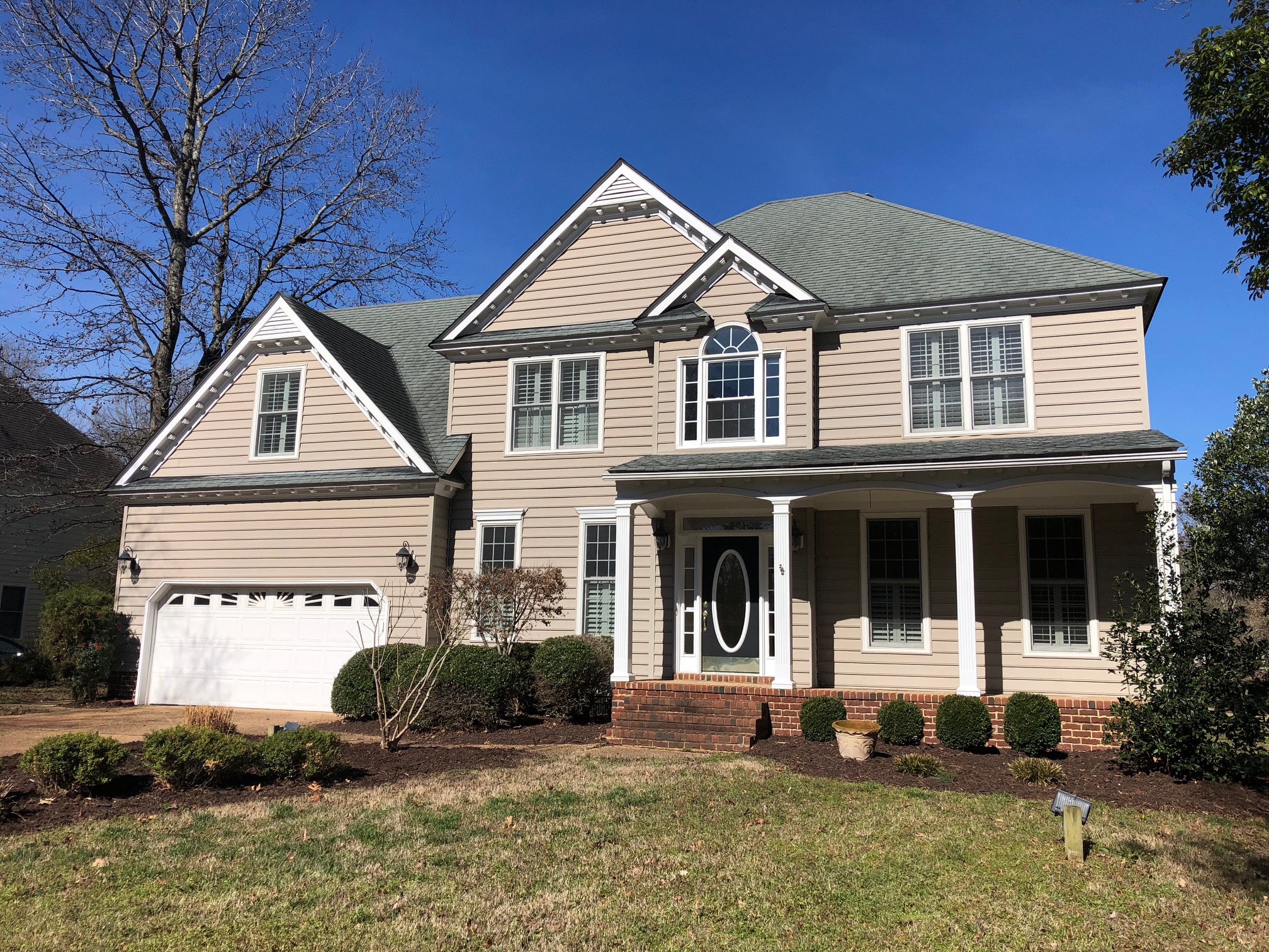 Two Story Family Room Highlights this Timeless Traditional in Gatling Pointe South East West